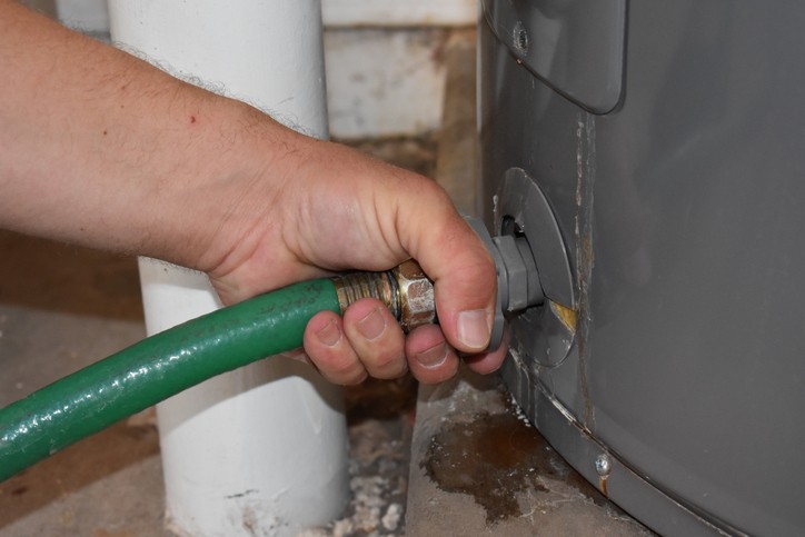 Draining water heater during spring cleaning
